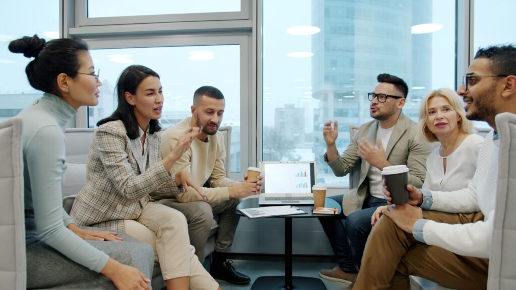 HR team reviewing high-volume candidate approvals on a digital dashboard
